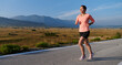 © .shock - Determined Dawn: Confident and Motivated Athlete Embarks on Sunrise Run.