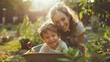 © Keitma - Mother gardening with her young son in their garden , family enjoying sun outside in their backyard