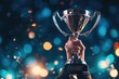 A person proudly holds a trophy in their hand at a sports awards ceremony, celebrating their achievement, A person raising a trophy high in a victorious moment, AI Generated