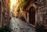 Fototapeta Uliczki - A photo showing a narrow cobblestone street lined with historic buildings in an old town, Narrow cobblestone streets in a historic European town, AI Generated