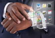 © ArcursJointTeam/peopleimages.com - Hand, smart watch and futuristic display with icons for business networking or location, notes or email. Person, wrist and applications or technology for planning schedule, screen or notification