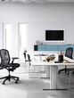 © Connect Images - Minimalist office space with a clean, modern design