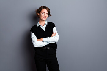 Sticker - Photo of positive good mood lady lawyer dressed black vest eyewear arms crossed empty space isolated grey color background