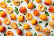 Colorful pattern of fresh ripe whole and sliced apricots