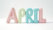 “APRIL” written in colorful pastel letters, creating a soft and pleasing visual experience