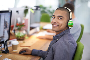 Aufkleber - Business, designer and portrait of man with headphones in office on computer for creative internship and web design. Employee, face and happiness for multimedia production, website or video at desk