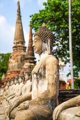 Wall Mural - Buddha statue and pagoda of Wat Yai Chai Mongkol Ayutthaya Province, Thailand, taken on 23-02-2024.
