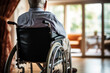 © Tetiana - AI generated picture of elderly patient in a wheelchair feel isolated hospital rehabilitation