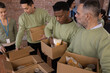 © ReeldealHD images - Volunteers packing at a local food bank