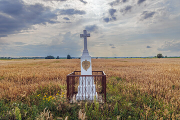 Sticker - Wayside shrine on a field in Wegrow County, rural area of Mazowsze region in Poland