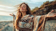 © Jasmina - Young woman wearing colorful poncho relaxing in beautiful nature with opened arms. Spirituality, harmony and connection with nature concept.