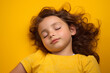 Studio portrait of cute tired sleeping child on white and colour background