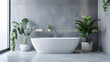 A serene bathroom design featuring a white freestanding bathtub, grey walls, and lush green indoor plants