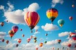 Colorful hot air balloons fill azure sky in aerostat festival