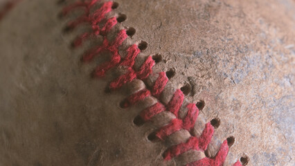 Sticker - Old grunge dirty baseball leather closeup shows dirty ball from sports game.