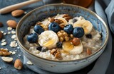Fototapeta Mapy - eine Frühstücksschüssel mit Blaubeeren und Bananen, a breakfast bowl with blueberries and bananas,