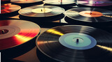 Fototapeta  - collection of vinyl records illuminated by a soft, ambient light 