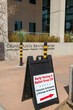 Early voting and ballot drop off sign board in English and Spanish in Tucson AZ
