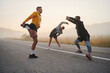 © .shock - Diverse Athletes Prepare: Dynamic Group Warms Up for Morning Run.