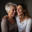 © Aevan - Mother and daughter embrace and laugh together