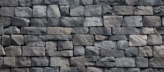 Poster - A detailed closeup of a gray brick wall showcasing the intricate patterns and textures of the rectangular building material