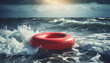 Red inflatable ring floating in stormy ocean. Tropical sea coast. Summer vacation at the ocean.