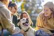 Group of students share laughter while playing with dog on the university campus. Dog Day concept