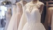 A beautiful wedding dress with intricate lace detailing. It has a fitted bodice with a sweetheart neckline and a full skirt.