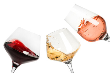 Sticker - Different types of wine splashing in glasses on white background