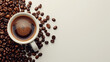 Top view of a steaming cup of espresso amidst scattered coffee beans, on a neutral background.