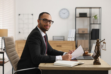 Sticker - Confident lawyer working with document at table in office