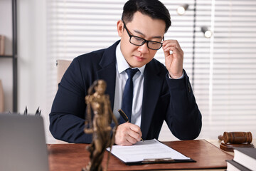 Wall Mural - Notary writing notes at wooden table in office