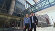 © stockbusters - Office colleagues posing street zoom in. Happy confident business partners