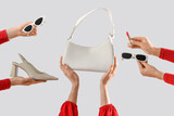 Fototapeta Panele - Female hands with stylish women's bag, sunglasses and high heels on grey background