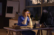 © Pixel-Shot - Tired female nurse with eyeglasses working evening shift at table in clinic