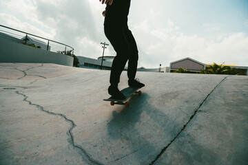 Wall Mural - Skateboarder skateboarding at skatepark in city