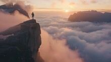 Traveler on cliff over clouds exploring sunset Segla mountain alone hiking adventure journey outdoor Norway vacations traveling lifestyle weekend getaway 