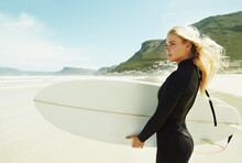Girl, Surfer And Holding Surfboard In Beach, Cape Town And Training For Surfing Sports In Nature. Athlete, Outdoor And Adventure In Sea, Free And Swimsuit For Waves In Summer, Water And Natural
