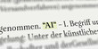 Das Wort AI im Buch mit Textmarker markiert