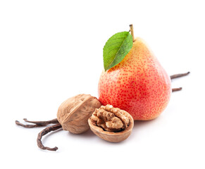 Wall Mural - Sweet pear with walnuts and vanilla stick on white backgrounds