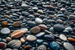 A close-up of stones on a calm beach, washed by moderate waves