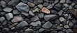 A collection of natural Bedrock and Cobblestone rocks, with a distinguishable brown rock in the middle, suitable for use as building material, road surface, or art