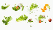 many vegetables. splash flying in the air on white background.