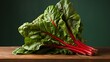 Vibrant Swiss Chard on Teal Background