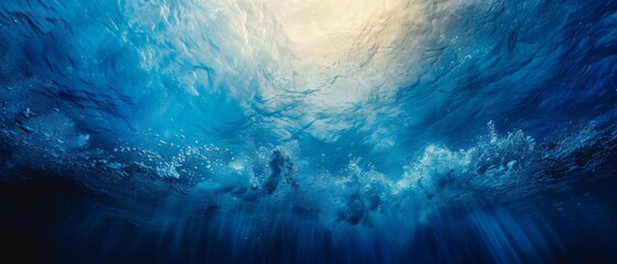 Poster - The underwater ocean is illuminated by the sun and has an abyssal blue color - ideal for diving and scuba diving