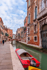 Wall Mural - Typical canal in Venice, in the Veneto region of Italy