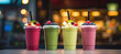 Fresh fruit smoothies on blurry background