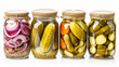 Variety of pickled vegetables in jars.