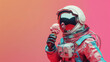 © Santijago - Summer fun creative concept with an astronaut eating ice cream on cone. Copy space.