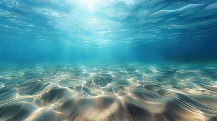 Wall Mural - Seabed sand with blue tropical ocean above, empty underwater background with the summer sun shining brightly, creating ripples in the calm sea water